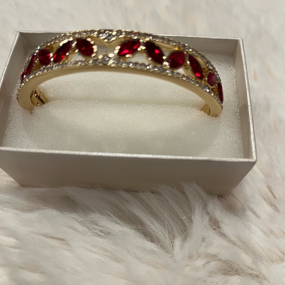 ANNE KLEIN bracelet new never worn 
Gold tone pave and color navette crystal